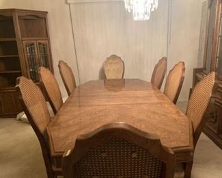 Dining room table, 8 chairs and buffet/china cabinet, comes with 2 additional extensions and pads, stained white oak  
