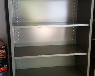 There are 8 of these shelves. Each are on wheels..have adjustable shelves!