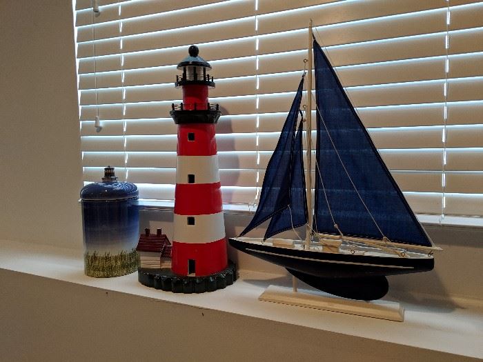 sailboat and lighthouse