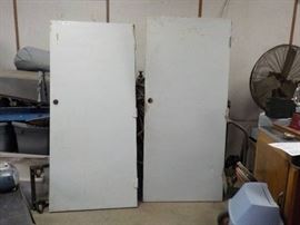 pair of metal exterior doors w hinges