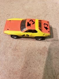 Aurora Cuda #43 Yellow and orange slot car.