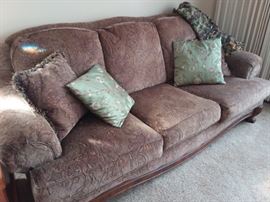 Lovely brown with gold accents Ashley Furniture sofa.