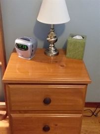 Wood nightstand with two drawers.