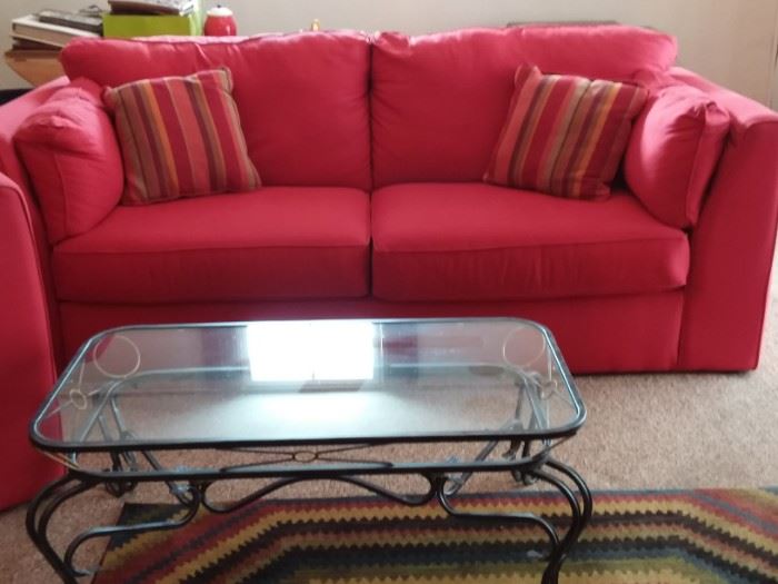 Red fabric sofa, love seat, armchair and ottoman. Light and clean.