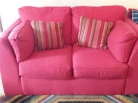 Red fabric sofa, love seat, armchair and ottoman. Light and clean.
