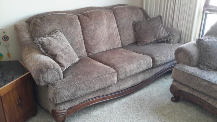Lovely brown with gold accents Ashley Furniture sofa.