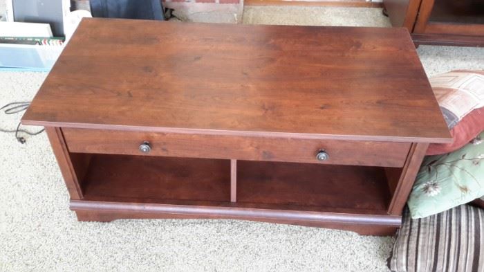 Coffee table with drawer.