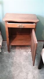 Very nice ice box end/accent table with drawer and on casters.
