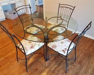 Kitchen table and four chairs. Seat covers from Calico Corners.