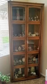 Beautiful Curio Cabinet with Beveled Glass.  (1 handle on the door is missing)