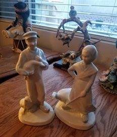 porcelain statue man with ducks signed Bette
