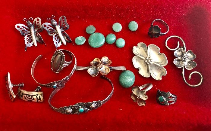 Southwest turquoise bangles, rings, butterflies, dogwood pins, rings.