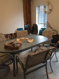 Patio Glass Top Table with Six Chairs, Jaws Shark Teeth and Jaw, Hook, Boogie Boards, Life Preserver