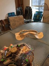 Patio Glass Top Table with Six Chairs, Jaws Shark Teeth and Jaw, Hook, Boogie Boards, Fishing Net, Fishing Lures