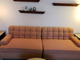 Pink with gold woven into the fabric!  This couch is a excellent condition!