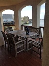 solid teak table and four chairs, bench is also for sale SOLD