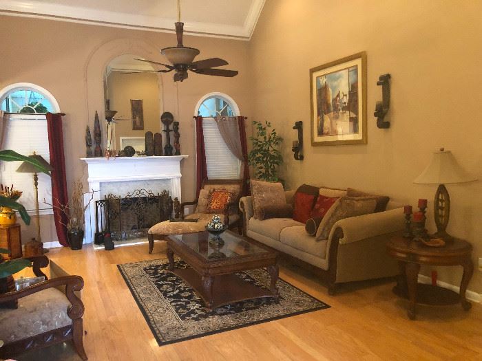 fireplace screen, lamps, area rugs, coffee table