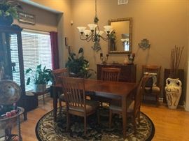 quality dining room set with table leaf and 6 chairs including 2 captain's chairs