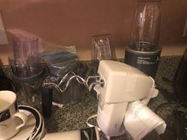 Egg beater with "Danger Will Robinson" robot arms