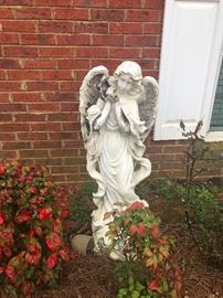 Yard angel to look over your flowers