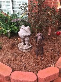 Concrete frog, cursed by a Disney witch, awaiting your kiss. Dog is a comedic sidekick