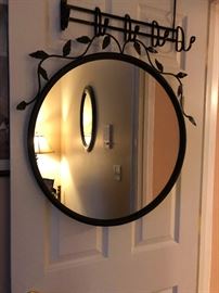 Mirror! Again, I'm standing in front of it but I'm a vampire and you can't see me.