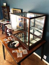Antique wood and glass curio cabinet