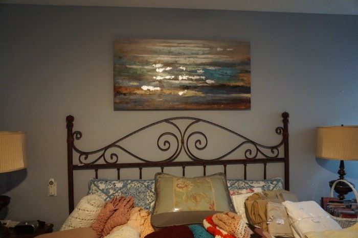 Wrought Iron Bed Frame                                                                                         Beautiful Wall Art with Blue, brown and gold accents