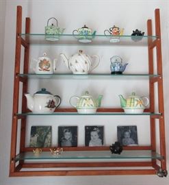 wall shelf and teapots