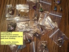 Lots of neckaces set in sterling or gold over sterling with semi-precious stones