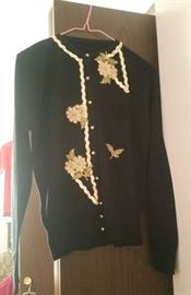 Awesome vintage cardigan with ribbon trim and sparkly buttons.