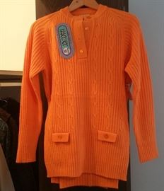 Carol Brady or Shirley Partridge? Long sweater, matching knit pants. 