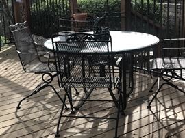 Mid century iron patio table and four chairs