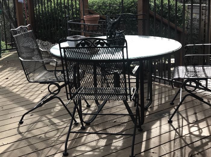 Mid century iron patio table and four chairs