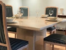 Travertine marble dining table and eight prisitne chairs