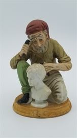 Sculptor at work figurine