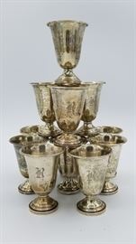 Set of 12 Sterling silver cups with weighted bases