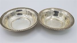 Sterling bowls, larger and smaller