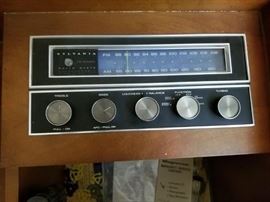Midcentury Sylvania console turntable and AM/FM stereo. Tested and works great!