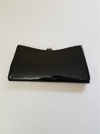 Black patent leather handback