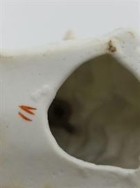 Ceramic figurines, bottom