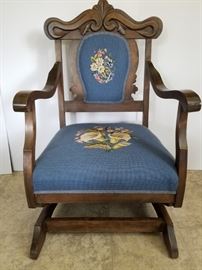 Antique embroidered rocking chair
