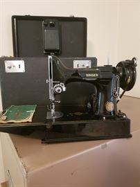 Vintage Singer Portable Electric Sewing Machine model 221-1 from the early 1950s