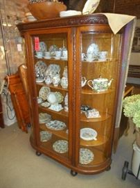Vintage curio Cabinet with curved glass panels, adjustable shelves Circa 1920s