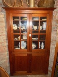 Vintage Corner cabinet, cherry wood, pegged construction.  In great condition.