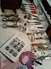 vintage egg beaters, and 1950's & 60's cooking utensils,  and small oil lamps