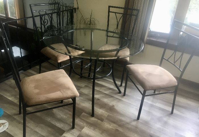 Round glass top dining table with 4 chairs