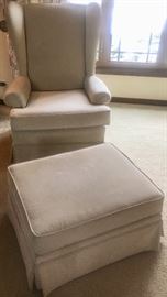 Wing back chair with footrest