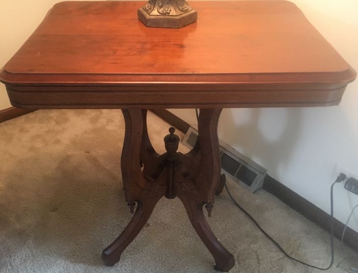 Antique pedestal accent table