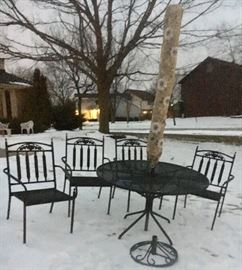 Round black metal Patio Table with 4 chairs umbrella & stand